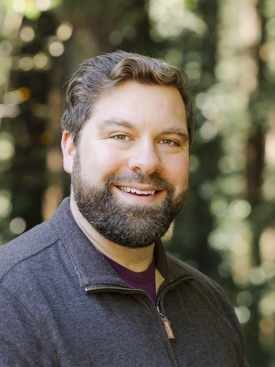 Dr. Nick Weathersby, Psy.D., photographed among redwood trees